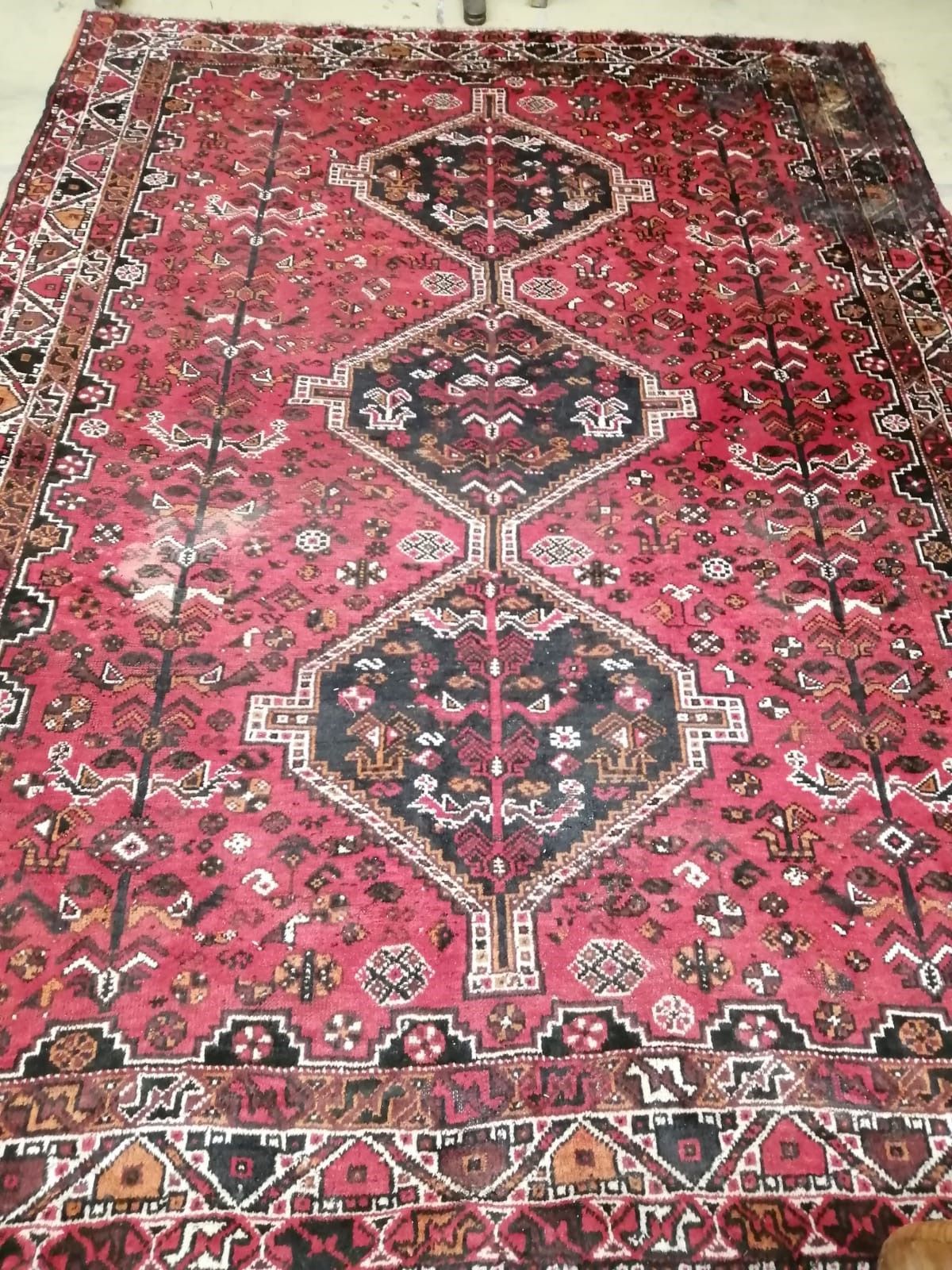 A Hamadan red ground carpet, 290 x 216cm